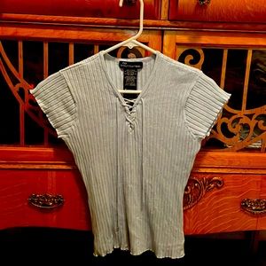 Light blue fitted top with lace front